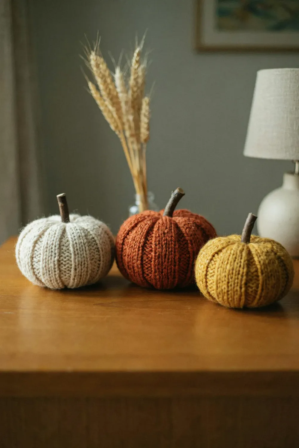 Cozy fall bedroom in warm feminine tones: dot Knitted Pumpkins on the Dresser