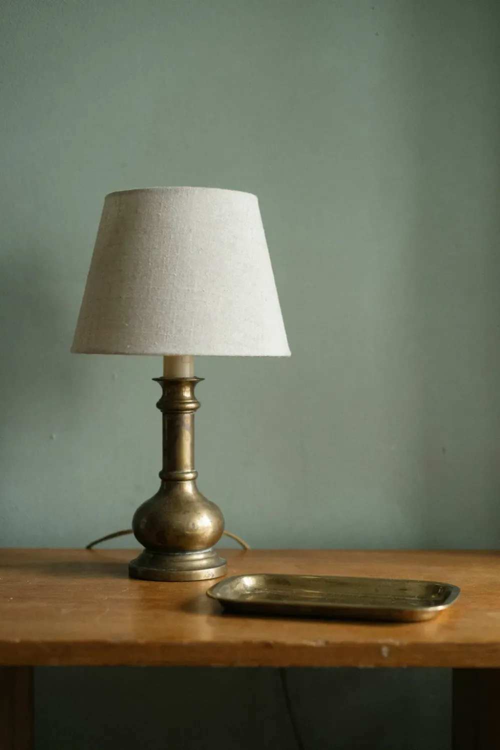 Warm sage green bedroom: warm the Green With Aged Brass