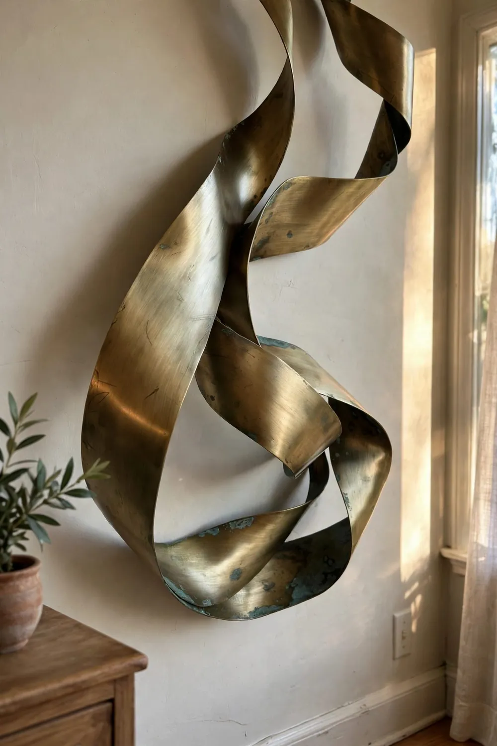 Modern living room with large sculptural wall art: metal Wall Sculptures: Movement and Shine