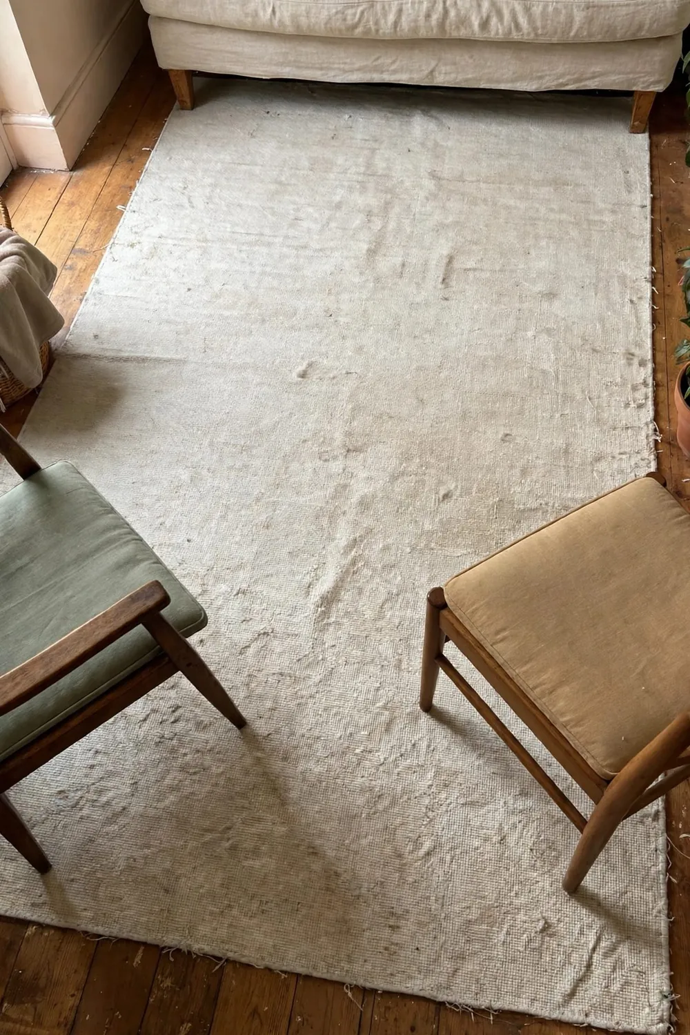 Small bright living room: anchor the Seating With One Right-Sized Rug