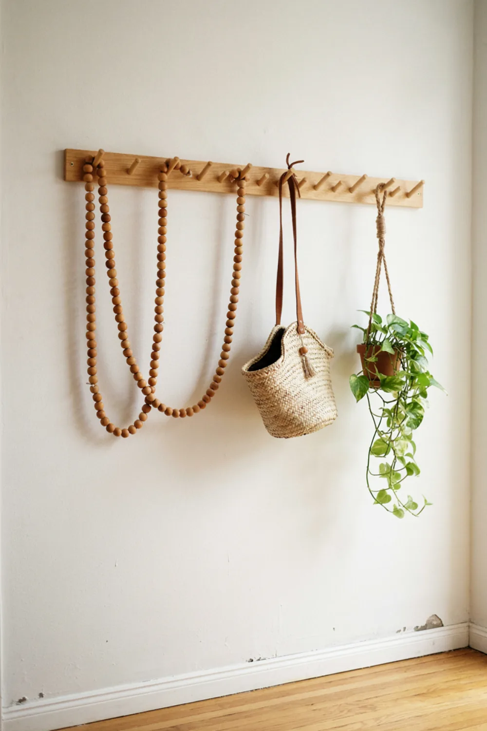 Room with warm wood wall decor: drape Wood Bead Garlands on a Rail